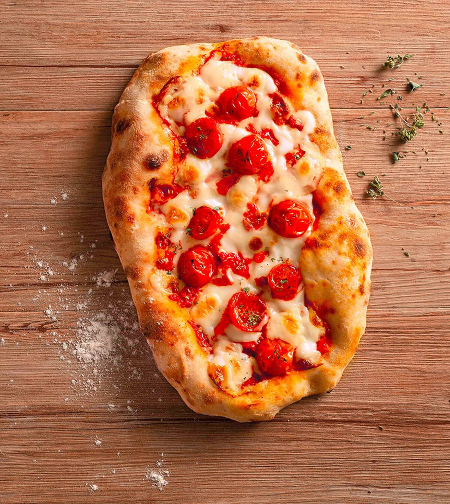 Pinsa with mozzarella and tomato