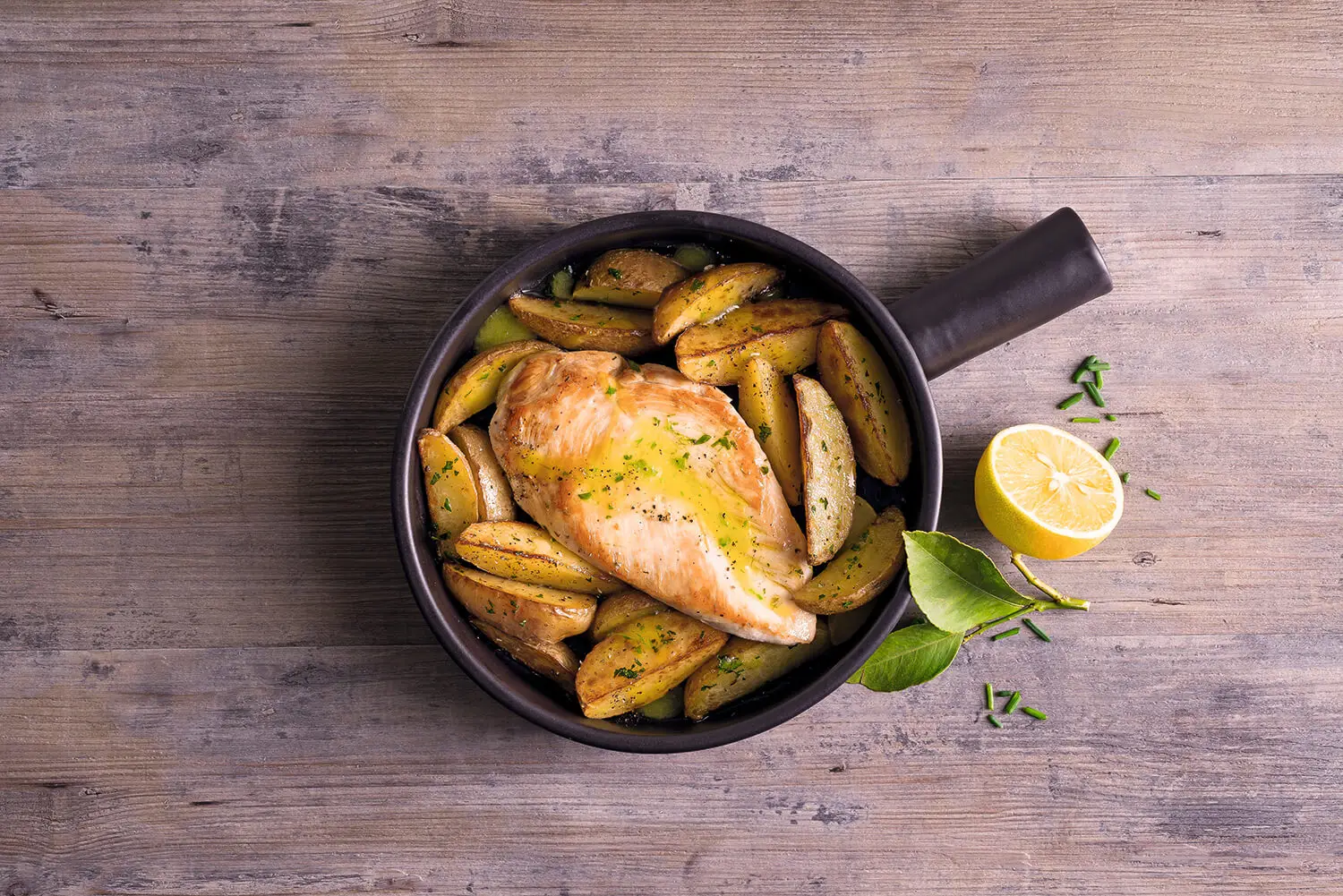 Chicken with Sicilian lemons and country-style potatoes