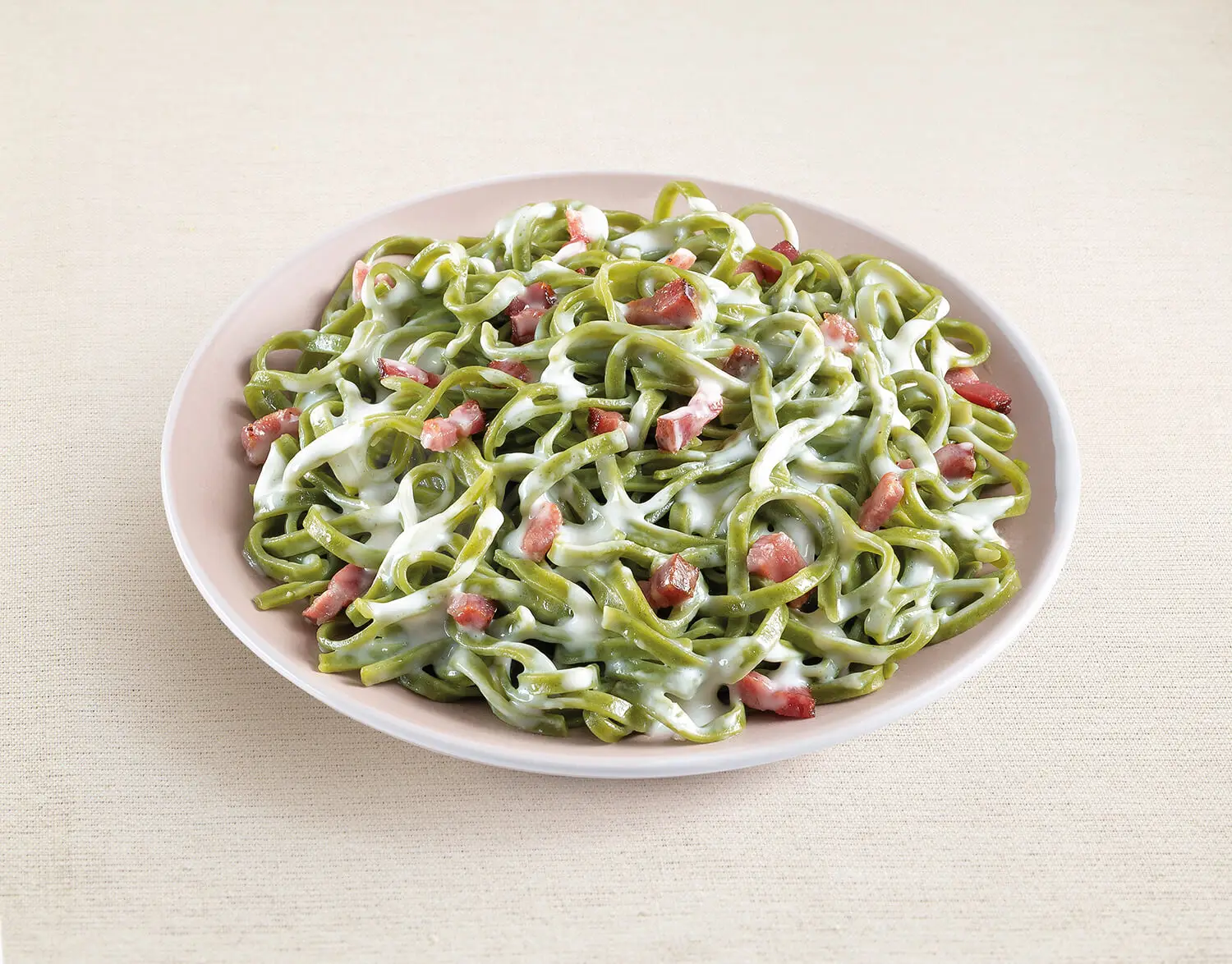 Green Tagliolini with cream and speck
